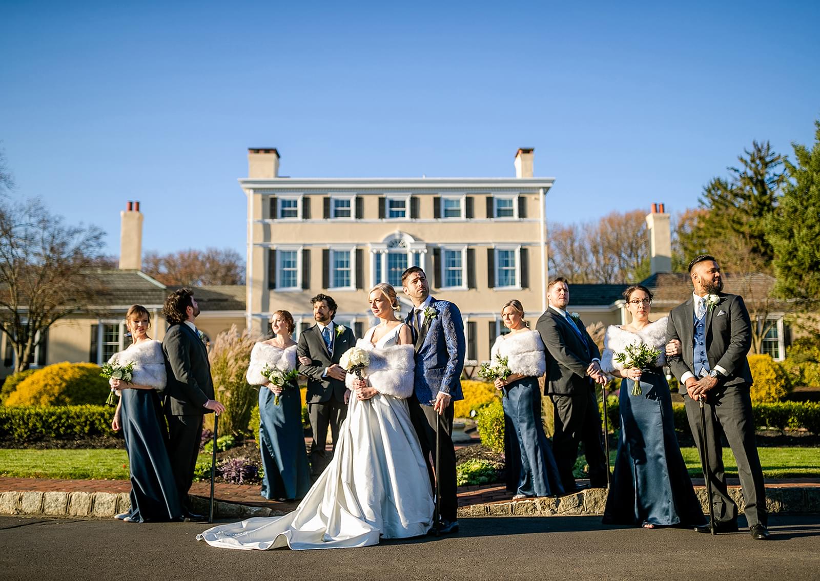 Wedding party photo at Pen Ryn Estate featuring the couple, bridesmaids, and groomsmen