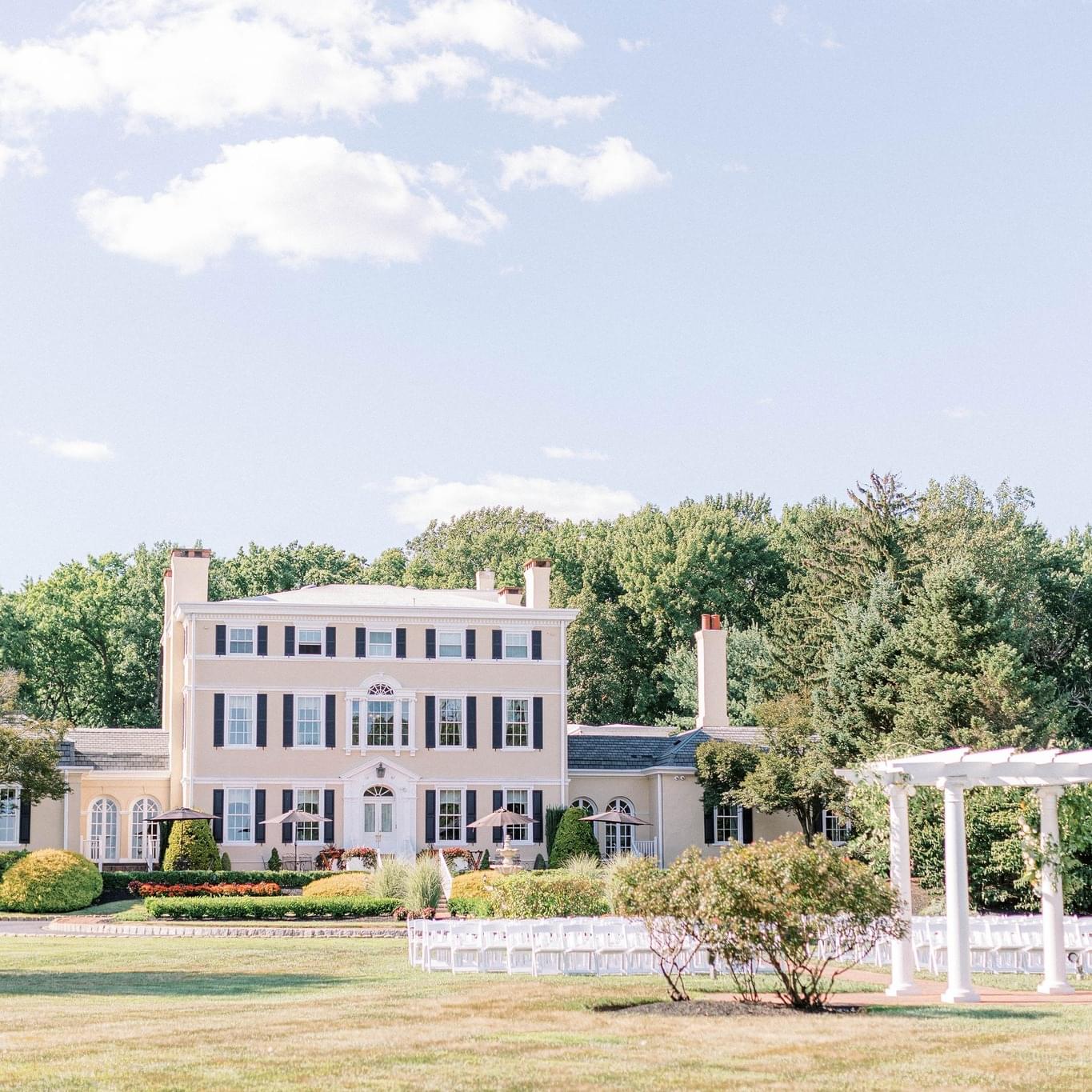 Elegant, Historic Penryn Estate event venue exterior with manicured lawn