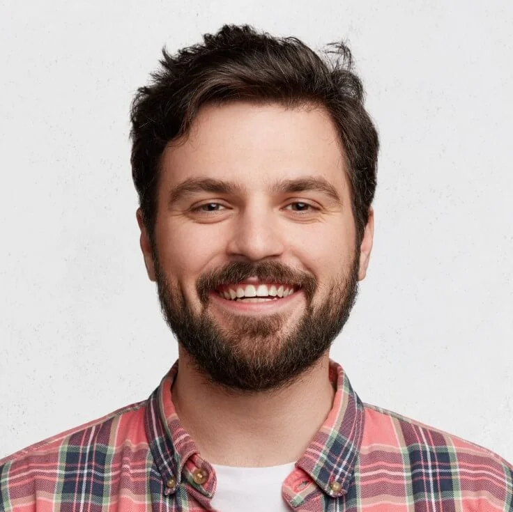 Young bearded man with striped shirt